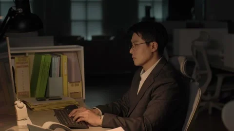 Businessman Typing on Computer. Korean text "회계". Translation: "Accounting". Stock-Footage 338161227