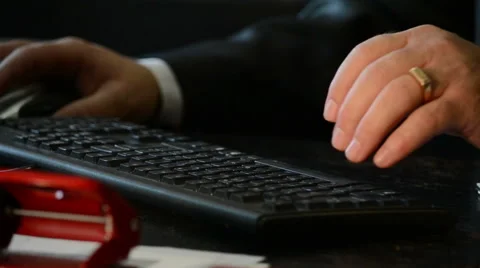 Businessman typing on a keyboard Stock Footage 55652577