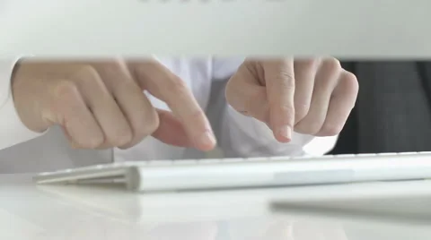 Businessman typing on a keyboard Stock Footage 66237726