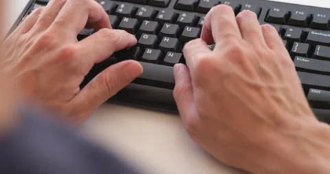 A businessman typing on a keyboard. Stock Footage 296602381