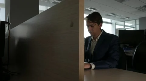 Businessman typing keyboard on laptop computer in the office, 4k UHD 2160p Stockbeeldmateriaal 64774201