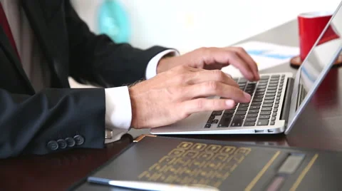 Businessman typing on laptop Stock Footage 55521348
