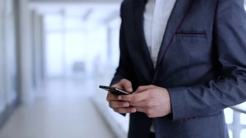 Businessman Typing Something On Cellphone Stock Footage 76326640