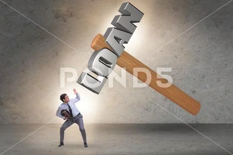Businessman under the burden of debt and loan Stock Photos