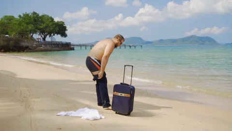 Undress Beach Stock Footage ~ Royalty Free Stock Videos Pond5