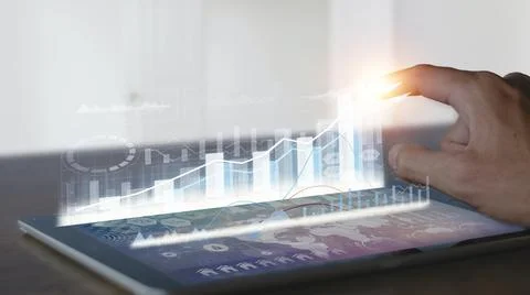 Businessman use tablet analysis graph for trade stock market on the screen Bu 스톡 사진