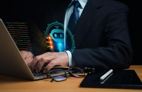 Businessman uses computer to type chat Ask and answer with the artificial i.. Stock Photos