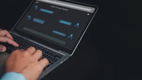 Businessman uses computer to type chat Ask and answer with the artificial i.. Stock Photos