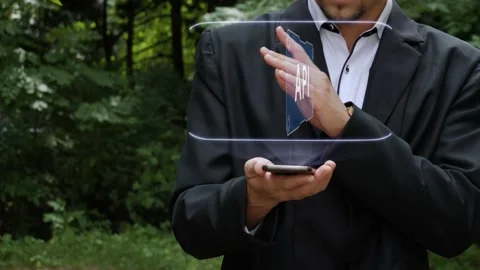Businessman uses hologram with text API Stock Footage 145751641