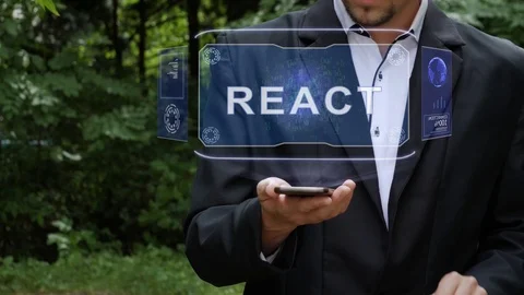 Businessman uses hologram with text React 스톡 동영상 117347125