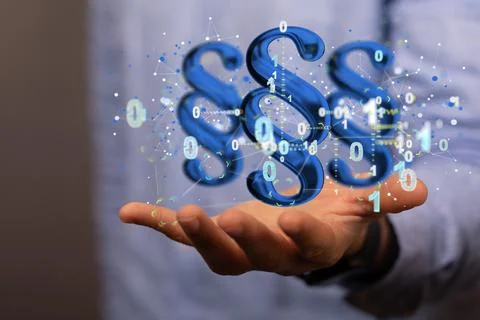 A businessman using a 3D rendering of digital paragraph law symbols surrounde Foto stock