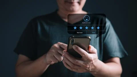 A businessman using application on tablet the virtual screen to give satisf.. Stock Photos