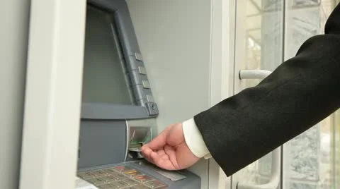 Businessman Using ATM Machine Stock Footage