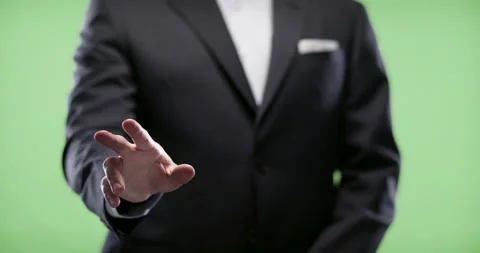 Businessman using Augmented reality touch display. Shot on green screen in 4k. Stock Footage 131570042