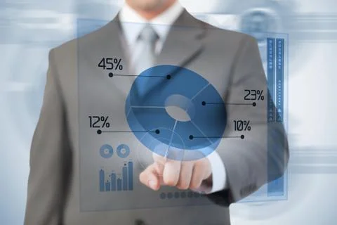 Businessman using blue pie chart futuristic interface Stock Photos