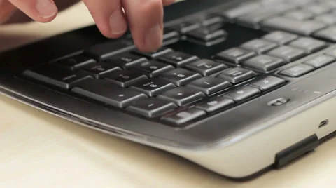 Businessman using a calculator on computer Video stock 33708046