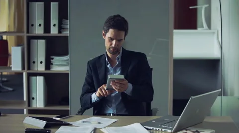 Businessman using calculator Stock Footage 63296933