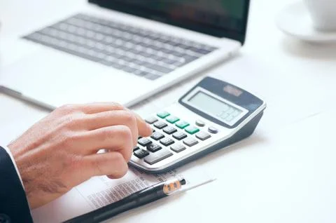 Businessman using calculator Foto stock