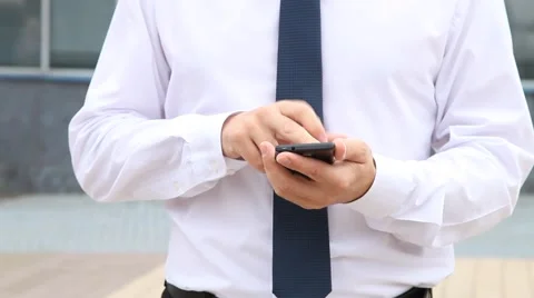 Businessman using a cellphone Stock Footage 54287304