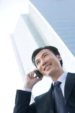 Businessman using cellphone Stock Photos