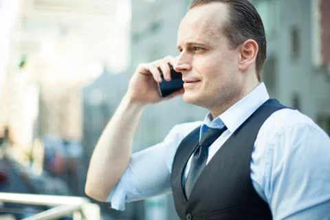 Businessman using cellphone Stock Photos