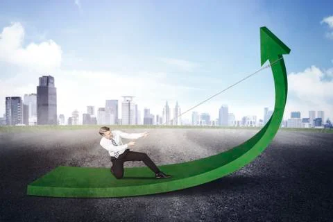Businessman using a chain to pull an upward arrow Stock Photos