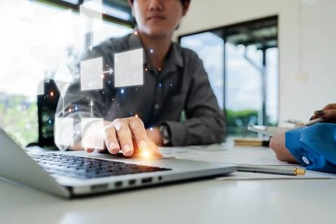 Businessman using a computer analysis for process and workflow automation with Stock Photos