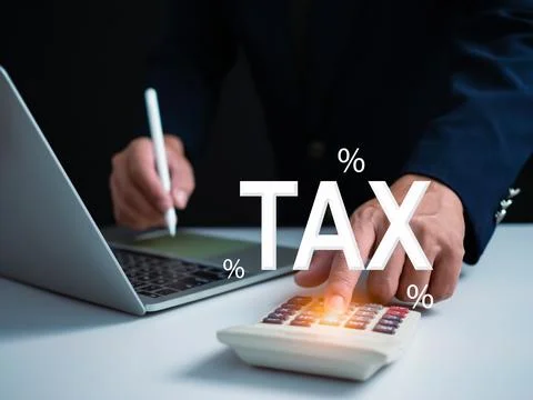 Businessman using computer and calculator for tax calculation, online perso.. Stock Photos