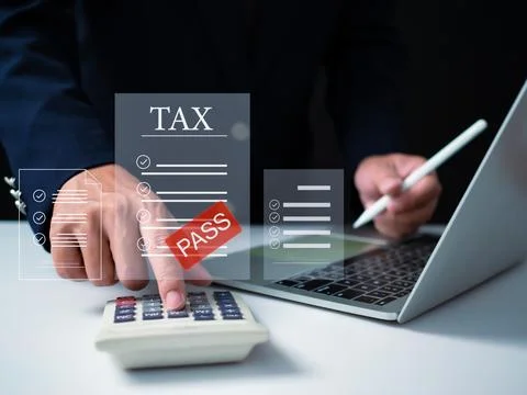 Businessman using computer and calculator for tax calculation, online perso.. Stock Photos