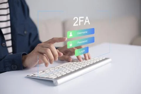 Businessman using computer and touching virtual screen for two-factor authent Stock Photos