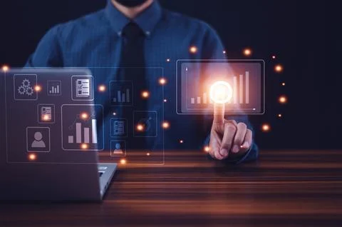 Businessman using computer data management and paperless document control a.. Foto stock