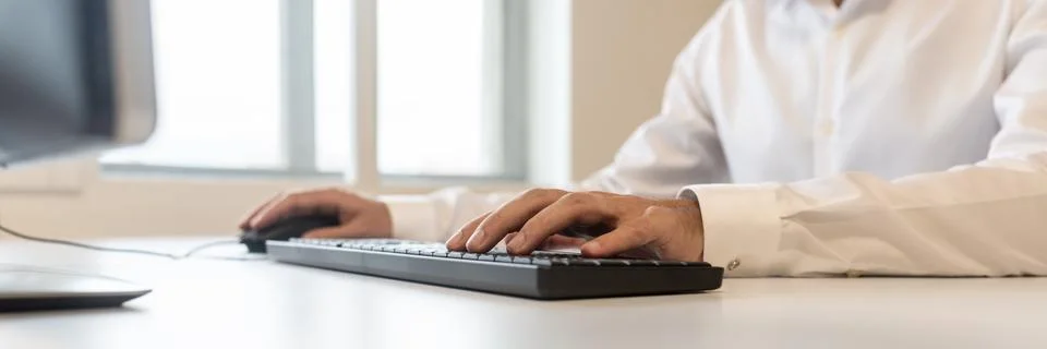 Businessman using computer keyboard 库存照片
