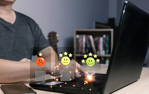 A businessman using computer laptop and touching the virtual screen on the .. Stock Photos