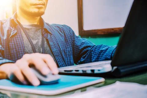 Businessman using computer laptop working in office Stock Photos