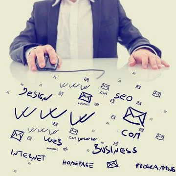 Businessman using a computer mouse Stock Photos