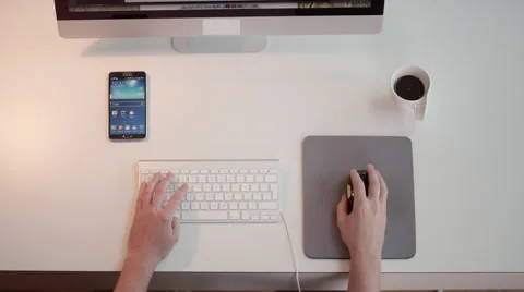 Businessman using computer at office desk. Stock Footage 64104569