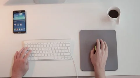 Businessman using computer at office desk. Stock Footage 64104738