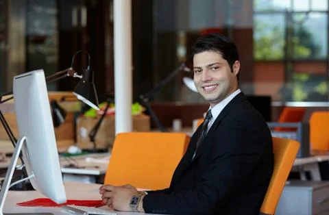 Businessman using computer in the office Stock Photos