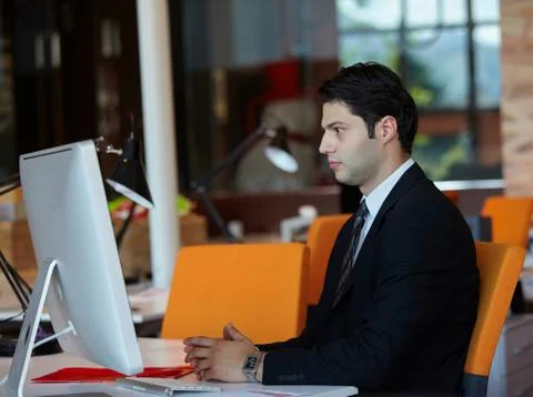 Businessman using computer in the office Stock Photos