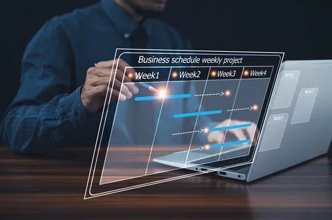 Businessman using computer for project business schedule by weekly, Busines.. Stock Photos