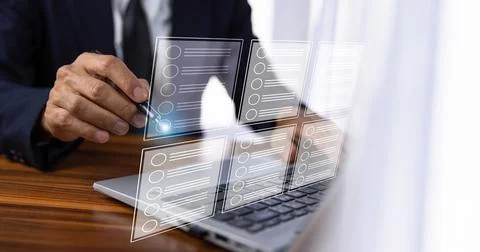 Businessman using computer visual screen show digital document checklist in.. Stock-Fotos