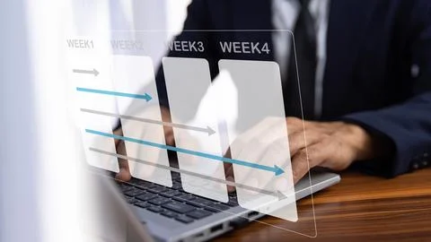 Businessman using computer for working plan by weekly for business and work. Stock Photos
