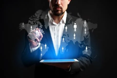 Businessman using CRM technology to manage customer data on a digital tablet Stock Photos