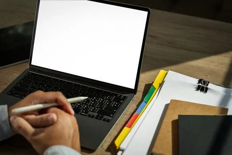 Businessman using a desktop computer of the blank screen device isolated sc.. Stock Photos