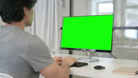 Businessman Using Desktop with Green Chroma Key Screen Stock Footage 146479551