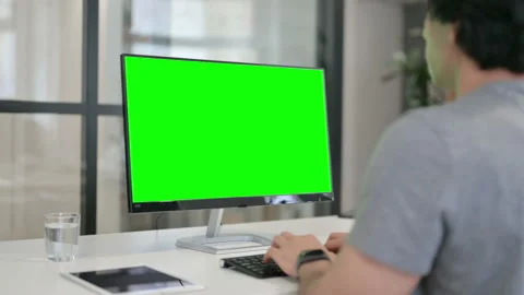 Businessman Using Desktop with Green Chroma Key Screen Stock Footage 146480357