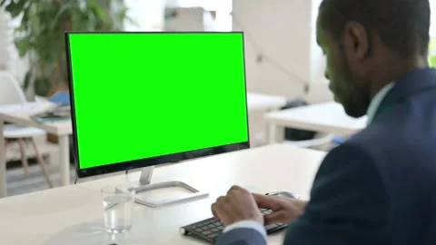 Businessman Using Desktop with Green Chroma Key Screen Video stock 146480661