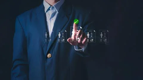Businessman using digital interface with icons and charts Stock Photos