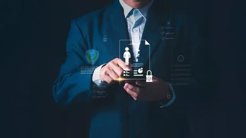 Businessman using digital interface with icons and data Stock Photos