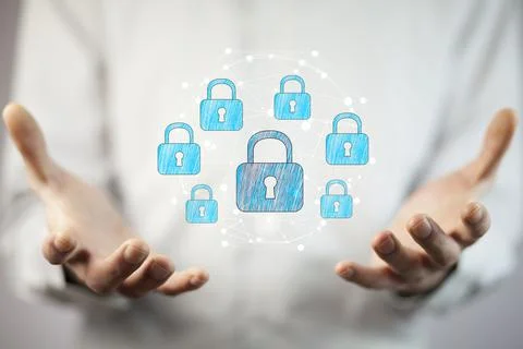 Businessman using digital padlock to secure Stock Photos